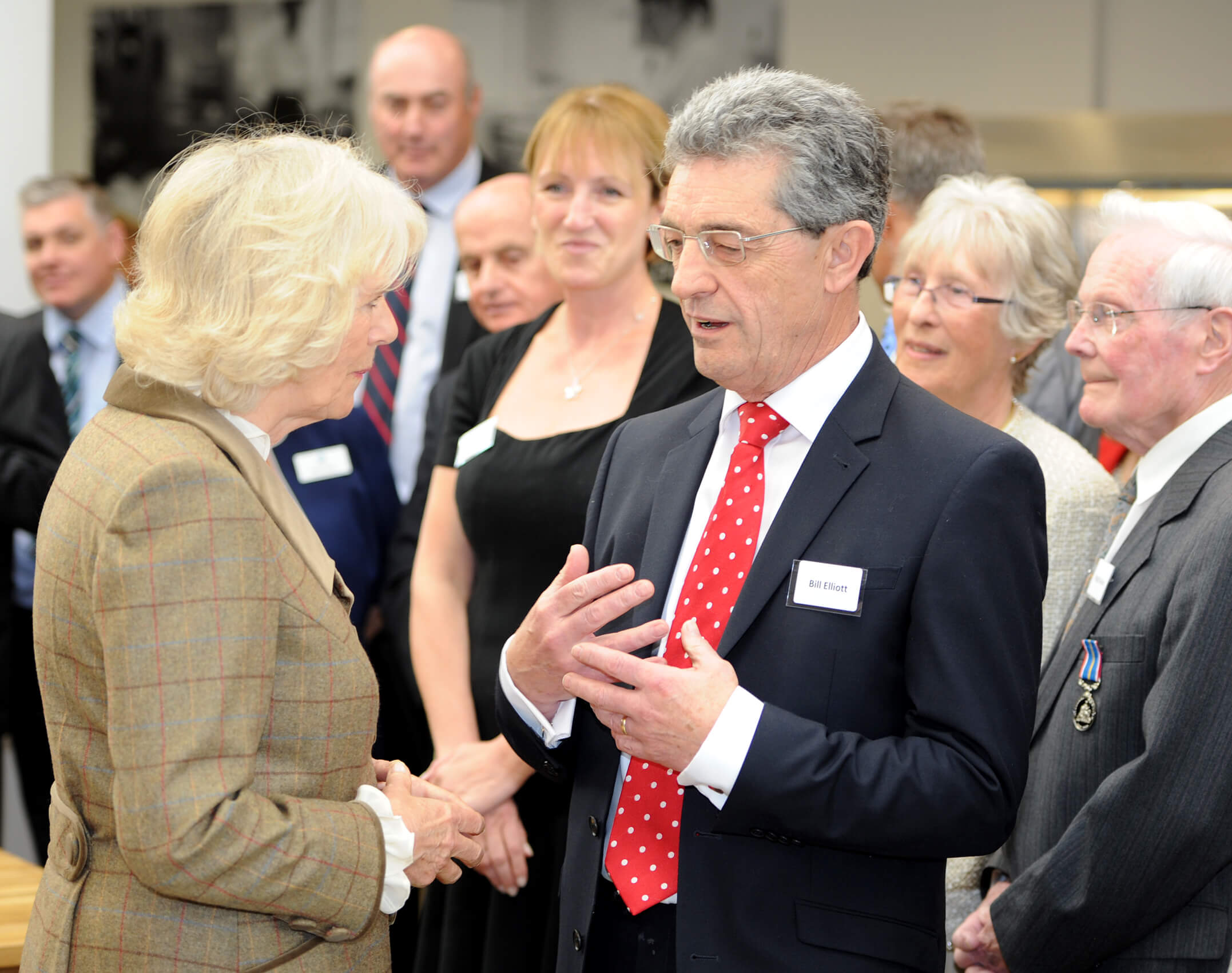 Photo of Bill Elliott being presented to HRH Duchess of Cornwall