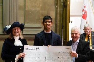 Tim Ollerenshaw and The High Sheriff of Warwickshire presenting Aaron Deshi with his winners cheque 